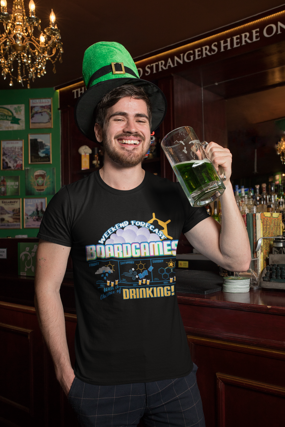 Man at a bar drinking beer wearing our weekend forecast board game t-shirt