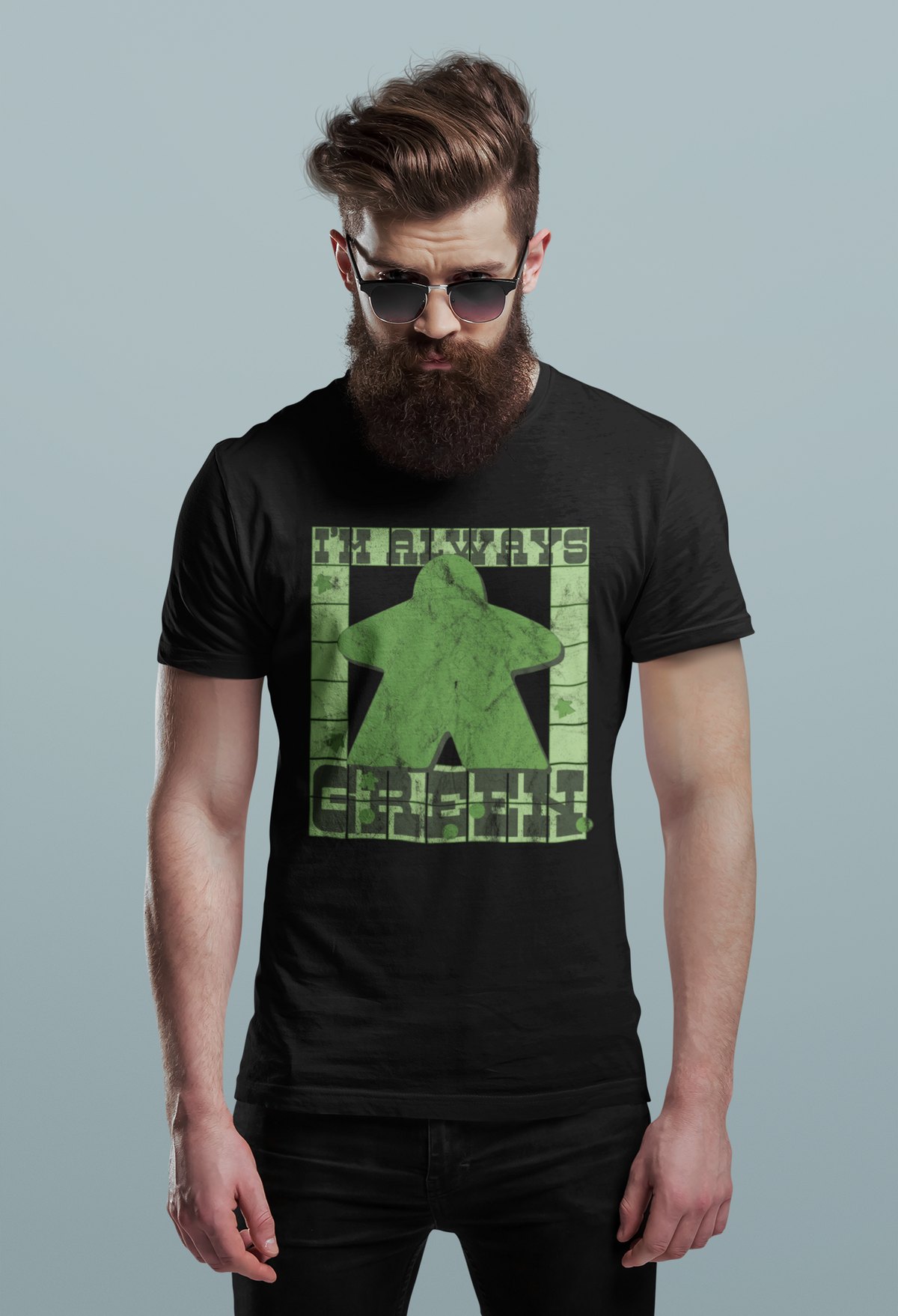 Man staring down the other players because he wants to be the green player while wearing our i'm always green t-shirt.