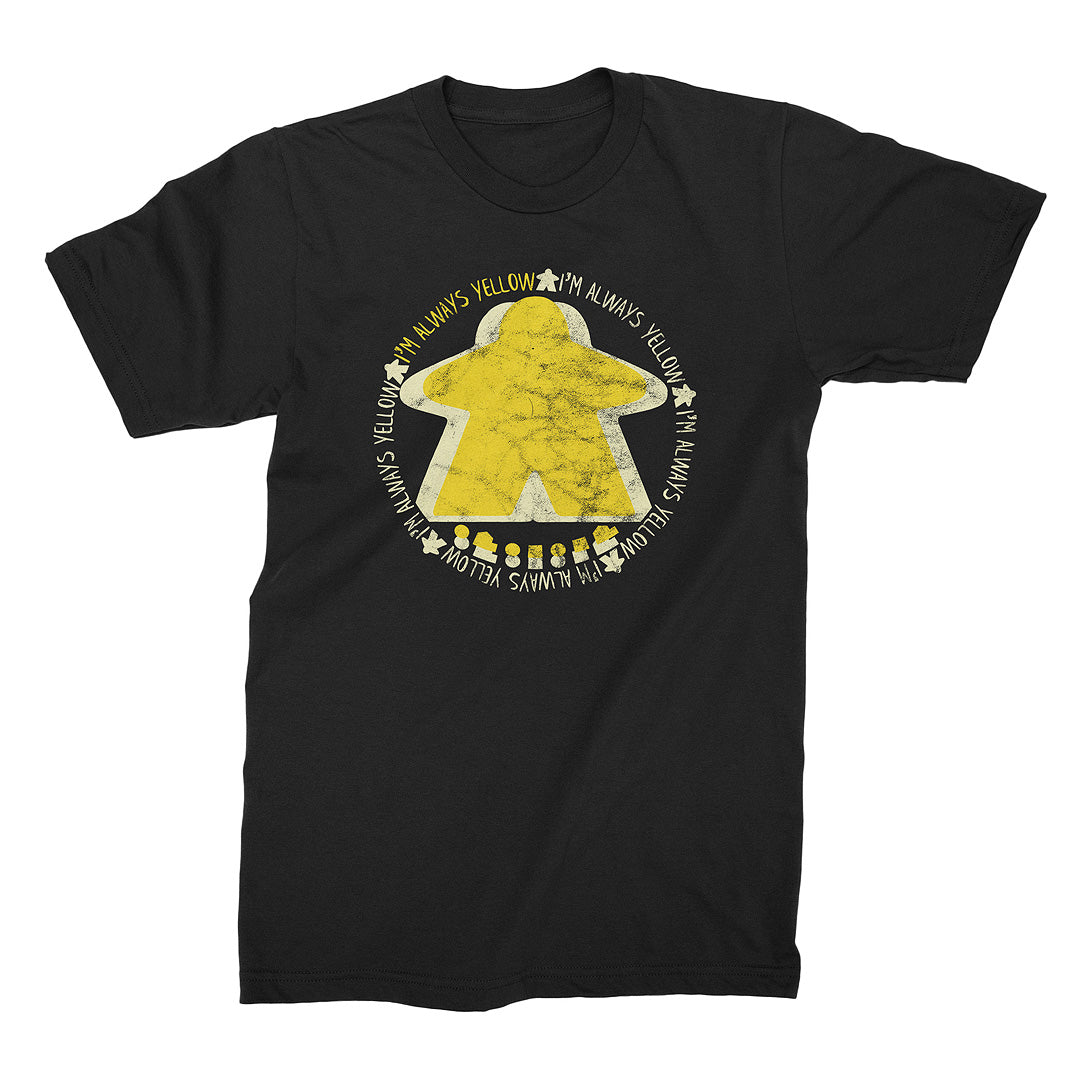 I'm Always Yellow Meeple Design on black t-shirt laying flat on white background