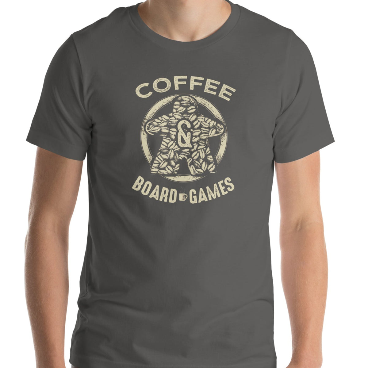 Man wearing a grey t-shirt featuring our Coffee & Board Games design