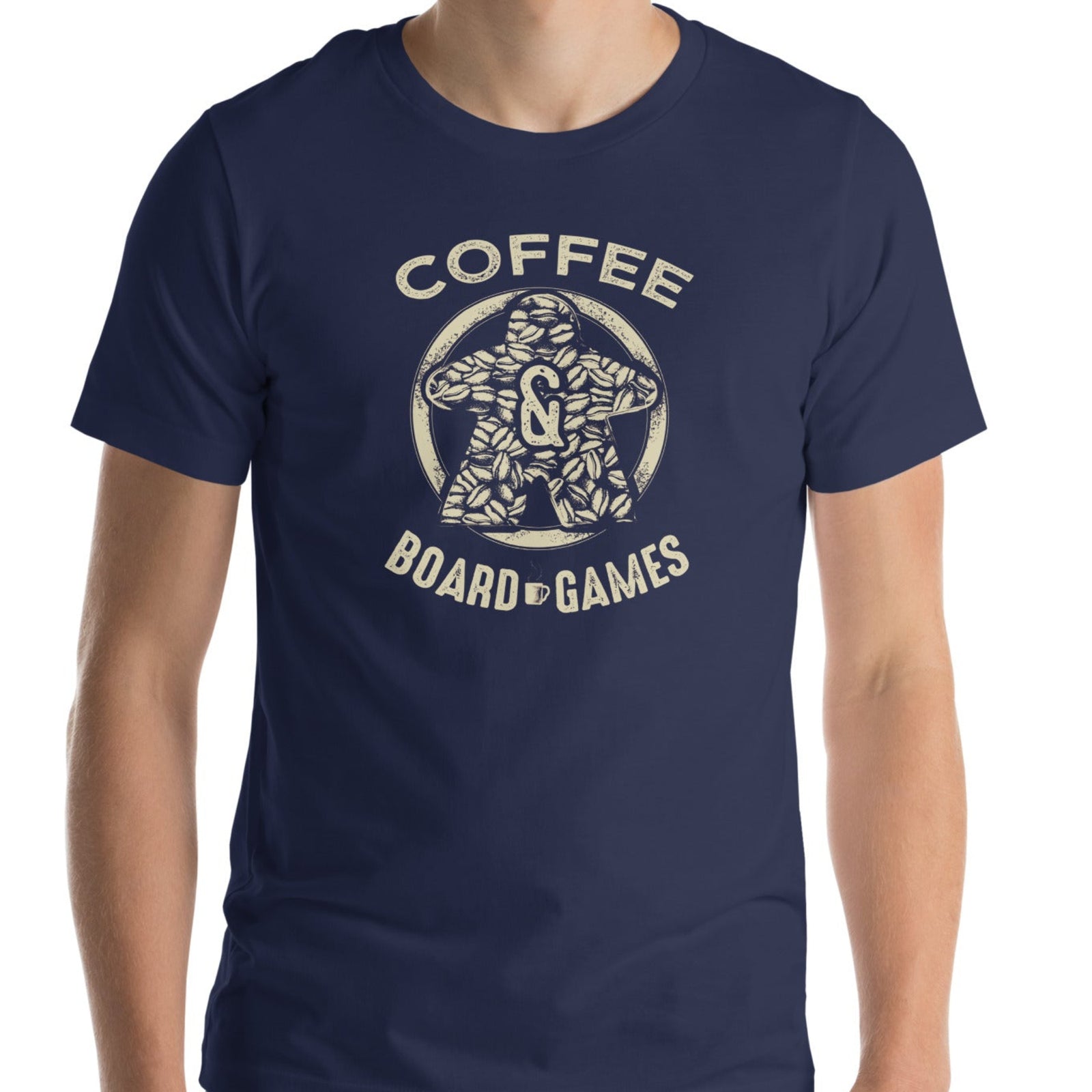 Man wearing a navy t-shirt featuring our Coffee & Board Games design