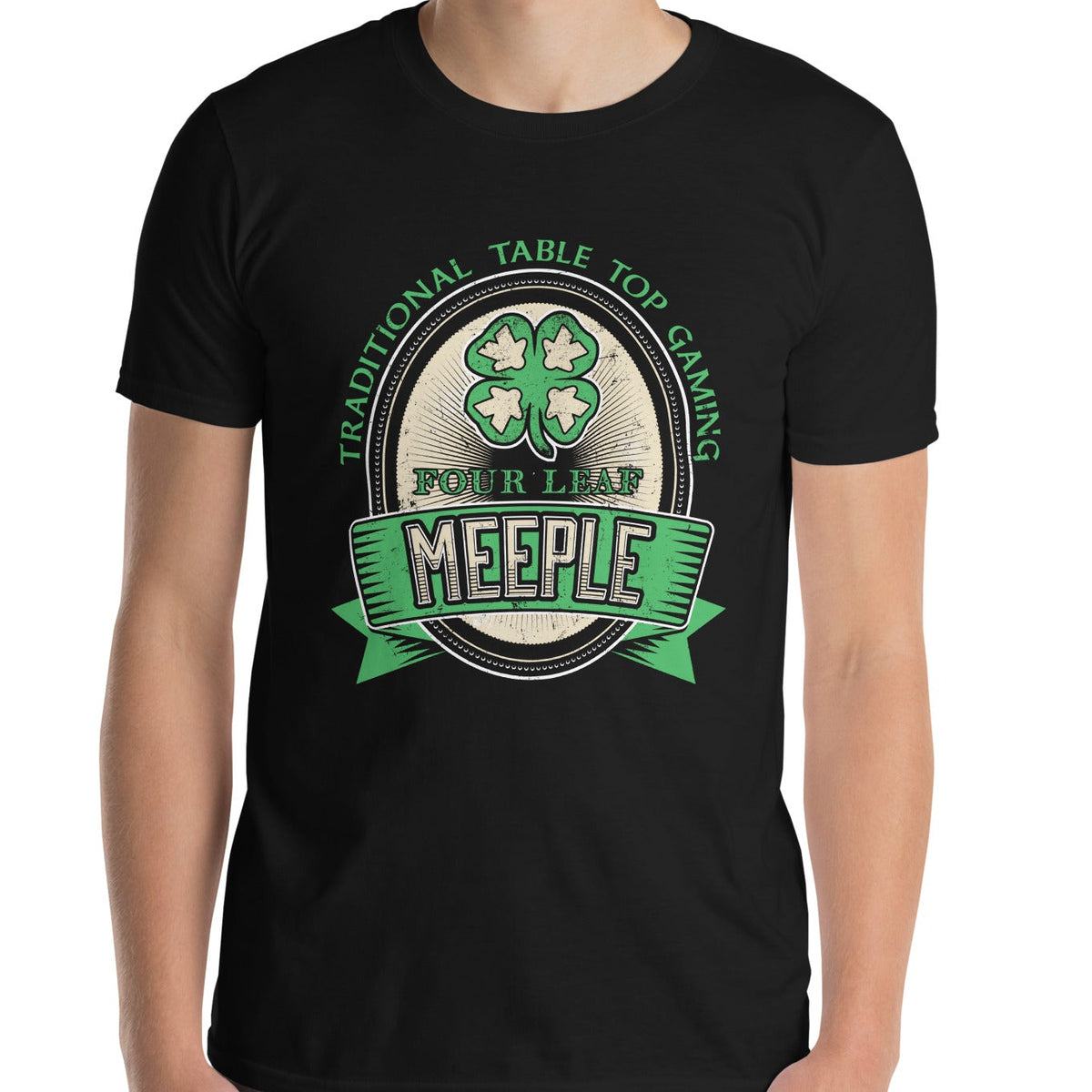 Model wearing a black t-shirt with our traditional table top gaming four leaf meeple design on it