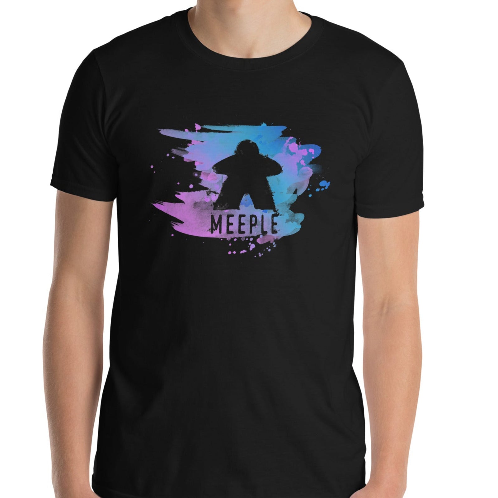 Model wearing black t-shirt with our Meeple Splash design on it