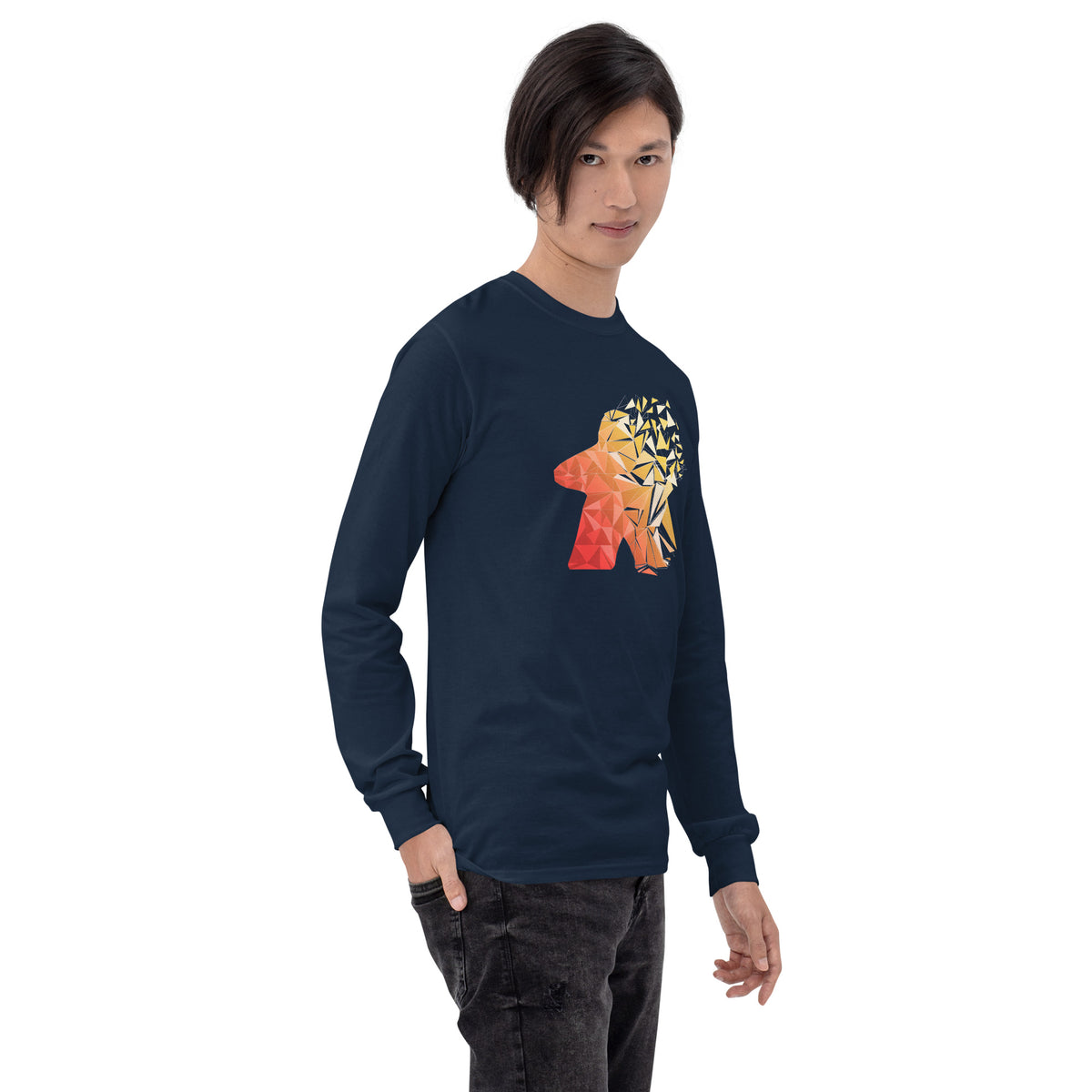 Model wearing long sleeve navy t-shirt with warm fragmented meeple design - Side view