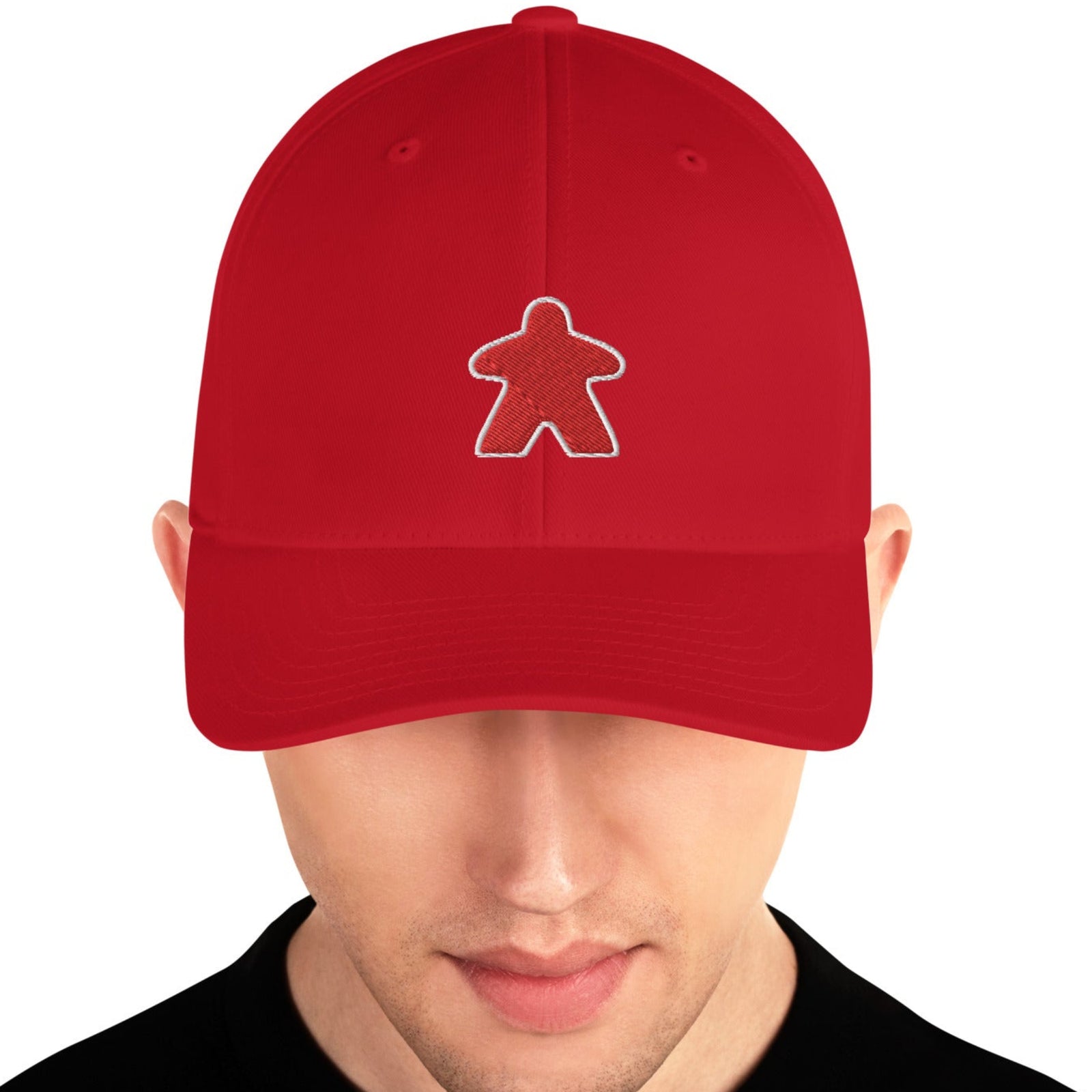 Red meeple design embroidered on a red baseball cap