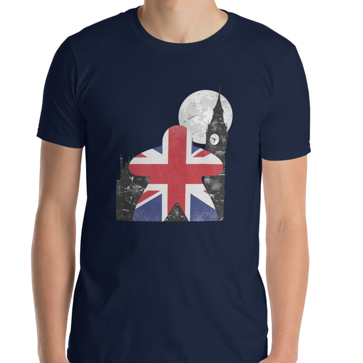 Model wearing navy blue t-shirt with a Meeple with the Union Jack design on it and Big ben in the background