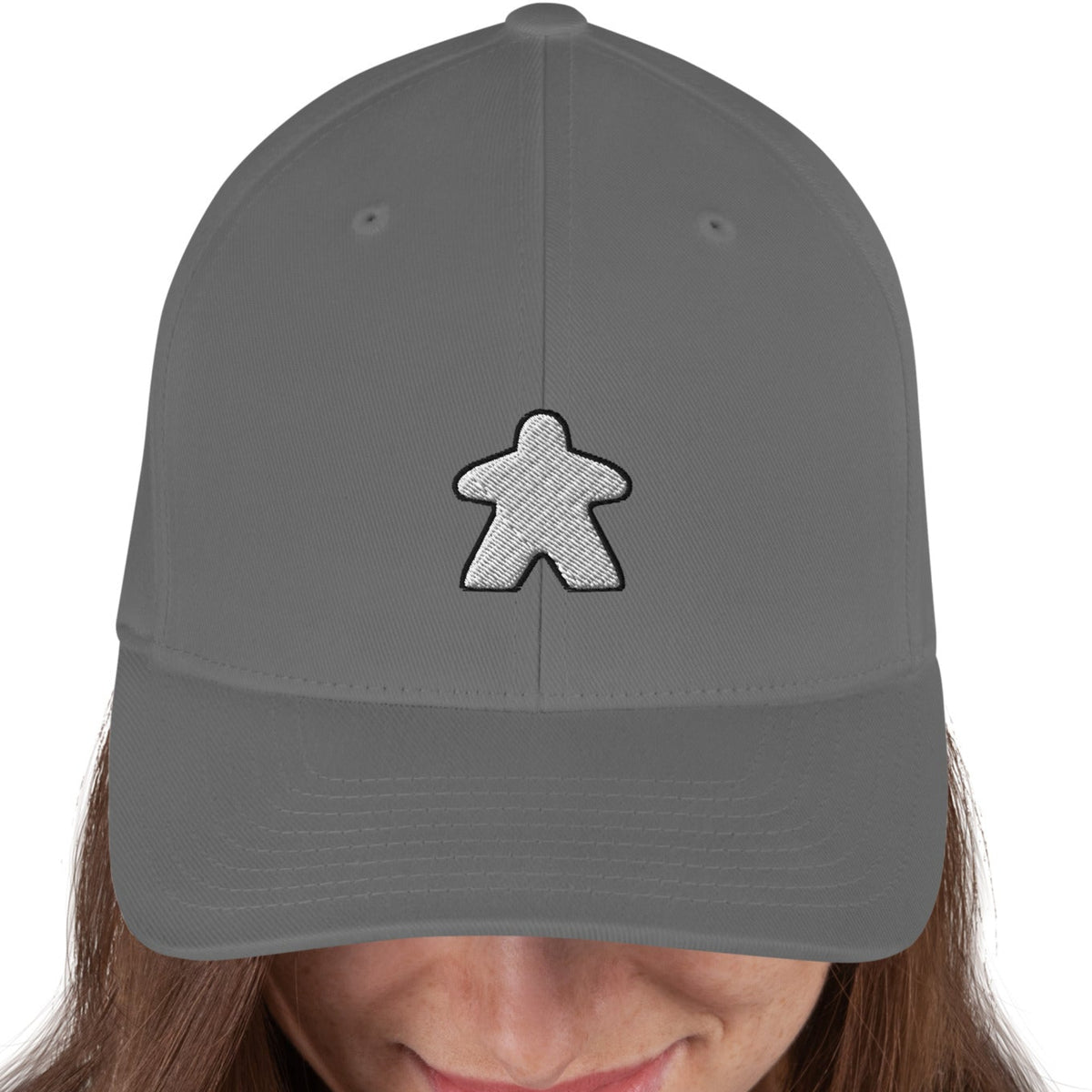 White meeple design embroidered on a grey flexfit baseball cap
