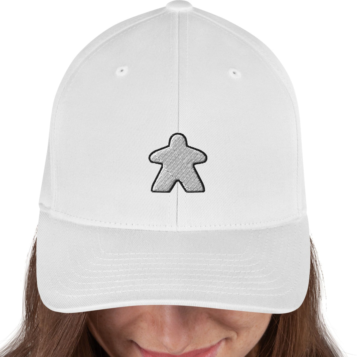 White meeple design embroidered on a white flexfit baseball cap
