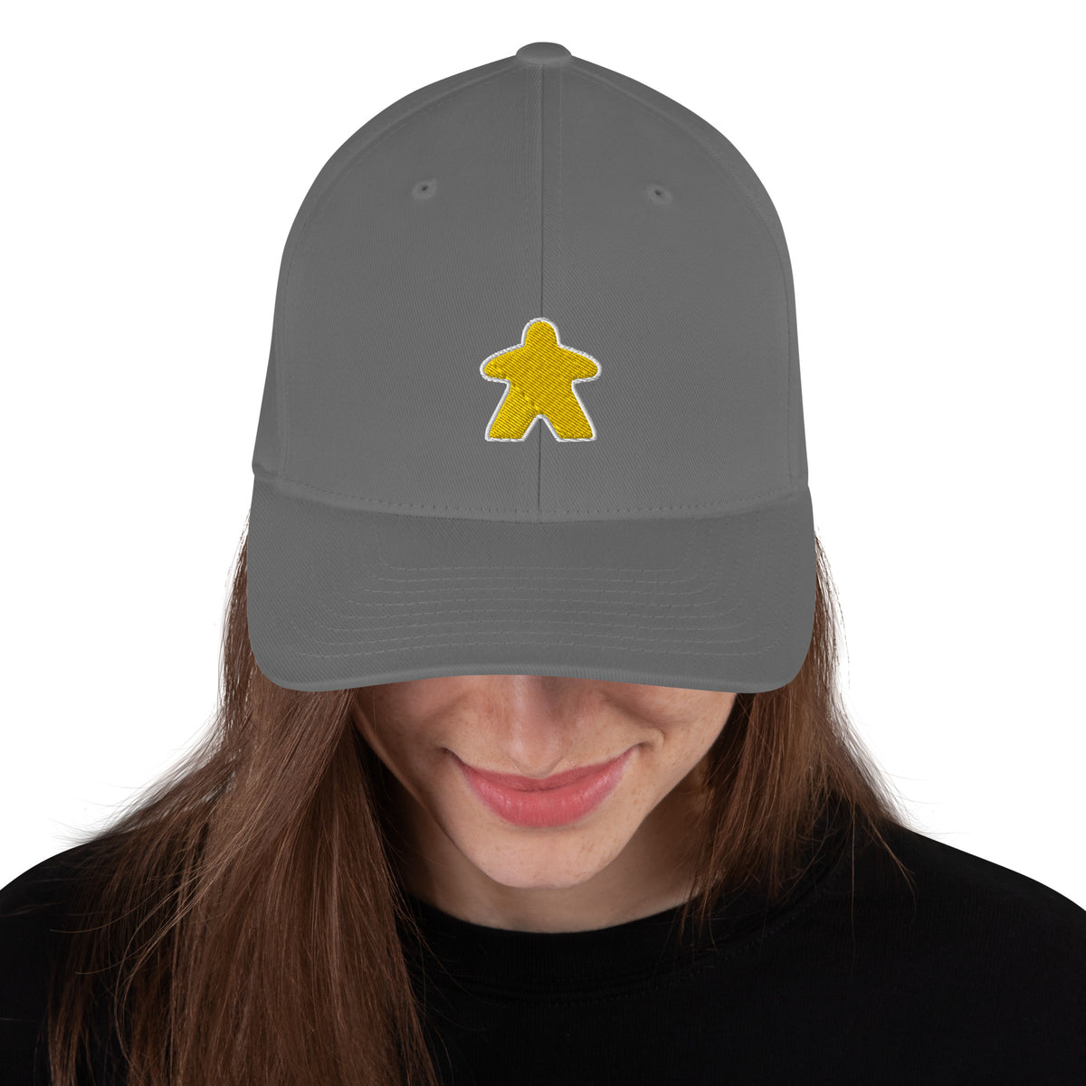 Yellow meeple design embroidered on a grey flexfit baseball cap